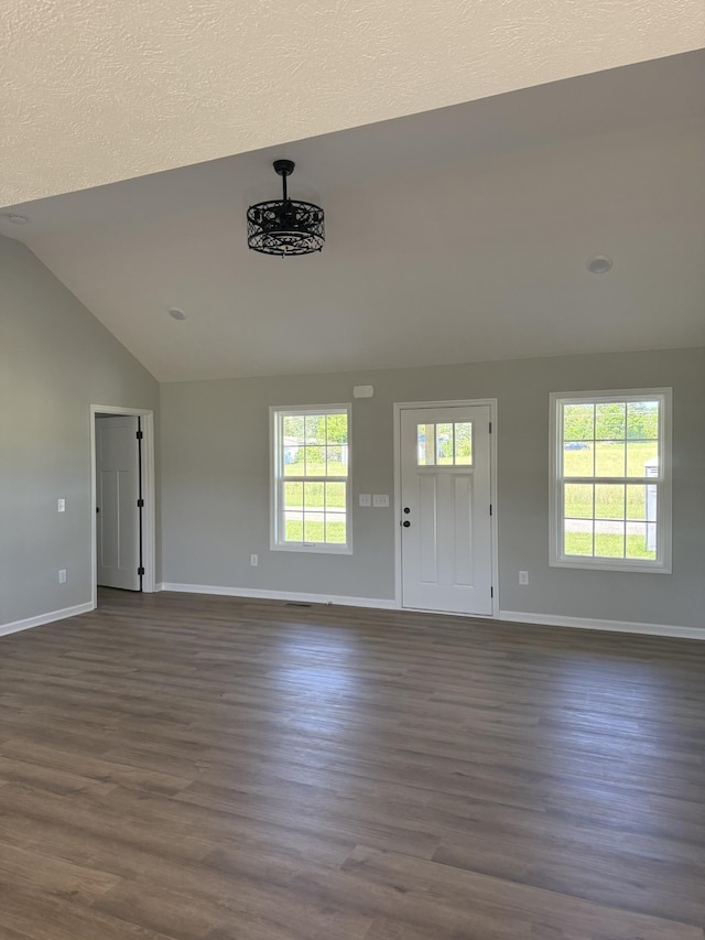 1331 Springplace Rd, Lewisburg, TN 37091 - entrance foyer with vaulted ceiling, dark wood-type flooring, baseboards, and a textured ceiling