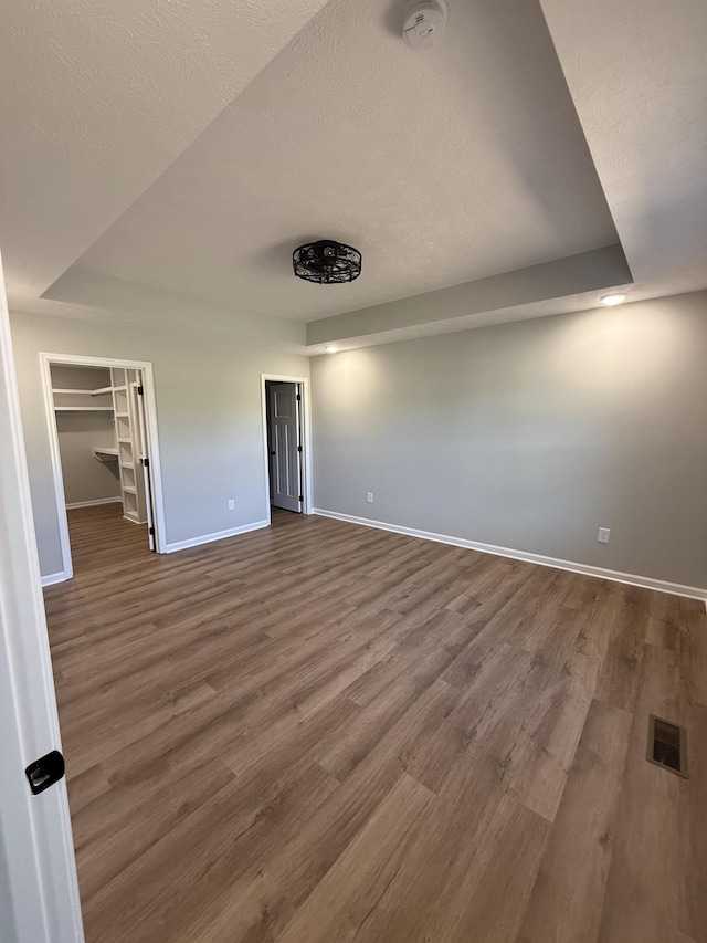 1331 Springplace Rd, Lewisburg, TN 37091 - unfurnished room with baseboards, a smoke detector, dark wood-style flooring, and a textured ceiling