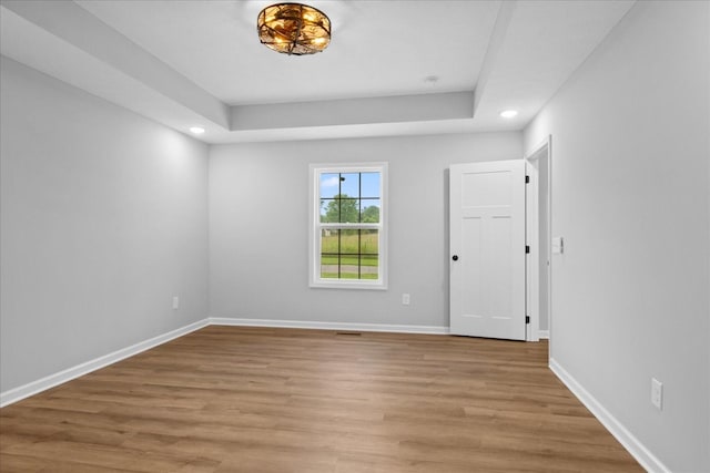1331 Springplace Rd, Lewisburg, TN 37091 - spare room featuring recessed lighting, light wood-style floors, and a raised ceiling
