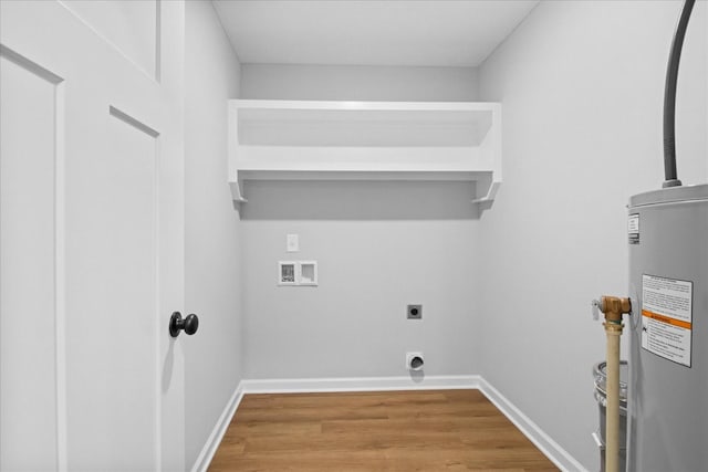 1331 Springplace Rd, Lewisburg, TN 37091 - laundry area featuring water heater, hookup for an electric dryer, hookup for a washing machine, and wood finished floors