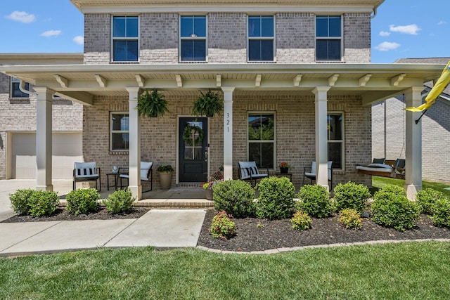 321 Union Pier Dr, Mount Juliet, TN 37122 - view of front of house featuring a porch and brick siding