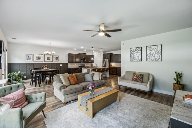 321 Union Pier Dr, Mount Juliet, TN 37122 - living room with a chandelier, wood finished floors, ceiling fan, and recessed lighting
