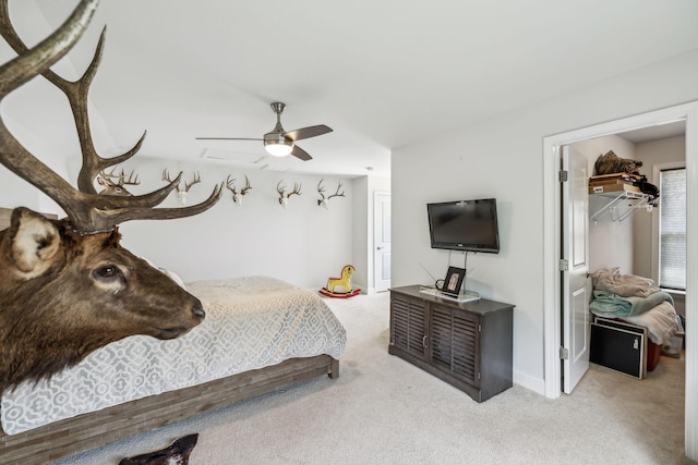 321 Union Pier Dr, Mount Juliet, TN 37122 - bedroom featuring light colored carpet, a closet, a ceiling fan, and a walk in closet