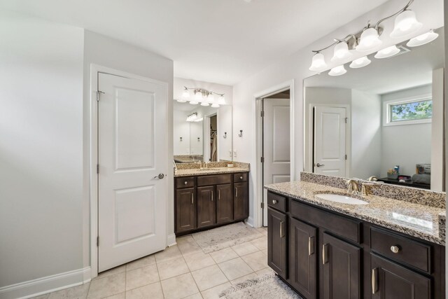 321 Union Pier Dr, Mount Juliet, TN 37122 - bathroom with two vanities, tile patterned flooring, and baseboards