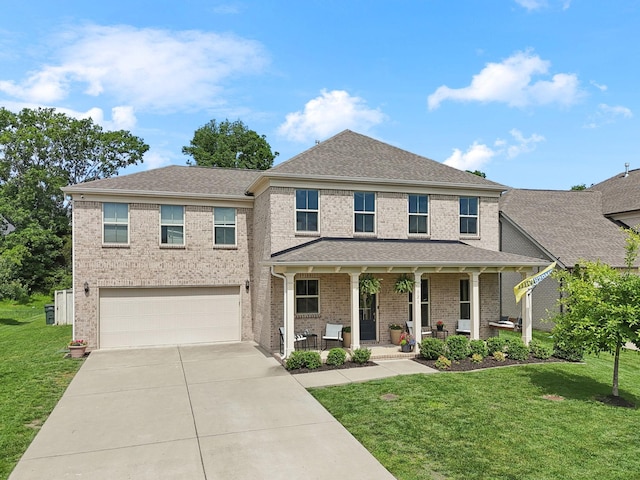 321 Union Pier Dr, Mount Juliet, TN 37122 - view of front of property with covered porch, concrete driveway, a garage, and a front yard