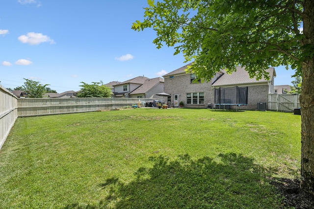 321 Union Pier Dr, Mount Juliet, TN 37122 - view of yard featuring a trampoline and central AC