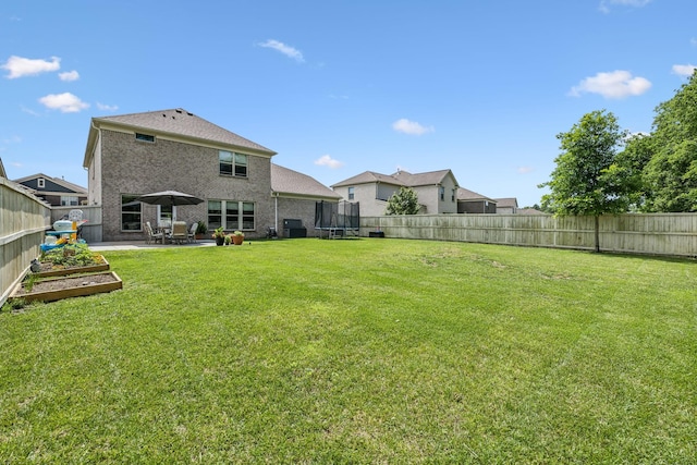 321 Union Pier Dr, Mount Juliet, TN 37122 - view of yard featuring a trampoline and a patio