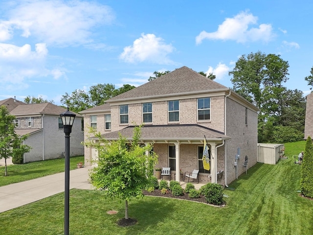 321 Union Pier Dr, Mount Juliet, TN 37122 - view of front of house featuring concrete driveway, a front yard, roof with shingles, and covered porch