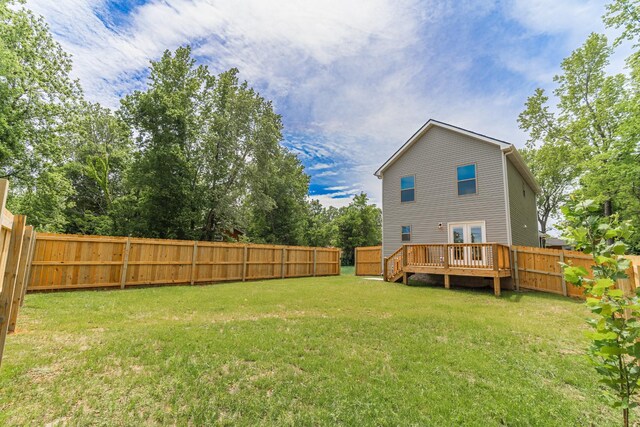27 Sevier St, Clarksville, TN 37042 - back of property with french doors and a wooden deck