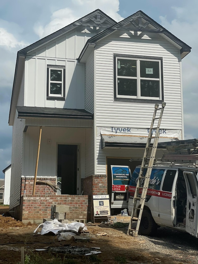 53 Charleston Cv, Clarksville, TN 37043 - view of front facade with brick siding and board and batten siding