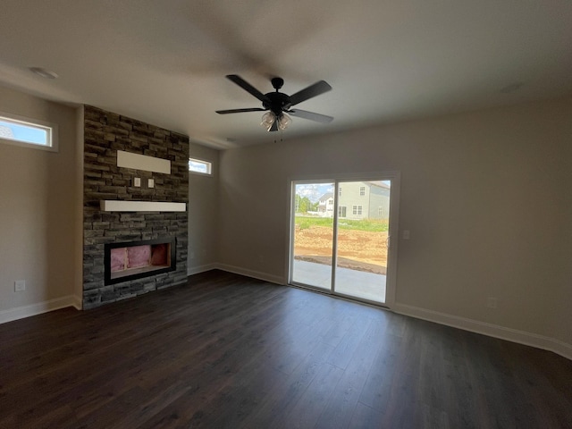 53 Charleston Cv, Clarksville, TN 37043 - unfurnished living room featuring a fireplace, dark wood finished floors, and ceiling fan