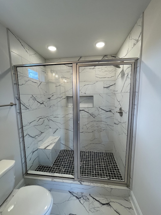 53 Charleston Cv, Clarksville, TN 37043 - bathroom featuring marble look tile flooring, a marble finish shower, and recessed lighting