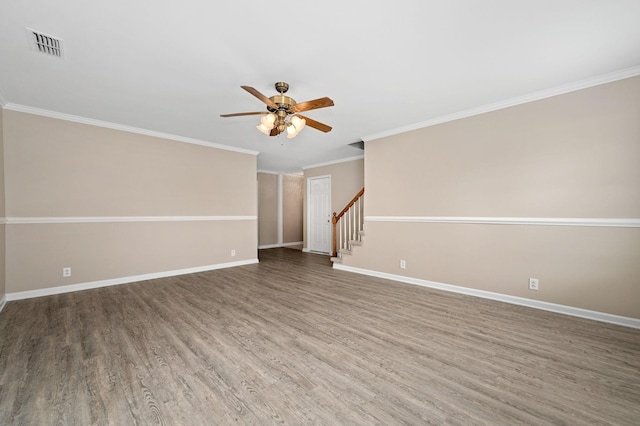 404 Biltmore Cir, Murfreesboro, TN 37128 - spare room with a ceiling fan, wood finished floors, baseboards, ornamental molding, and stairway