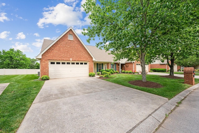 404 Biltmore Cir, Murfreesboro, TN 37128 - view of front of property with brick siding, a garage, driveway, and roof with shingles