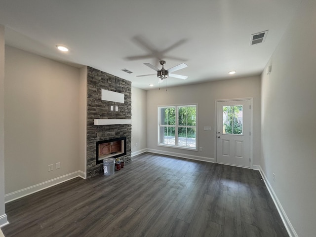 54 Charleston Cv, Clarksville, TN 37043 - unfurnished living room with dark wood-style floors, ceiling fan, a stone fireplace, and recessed lighting