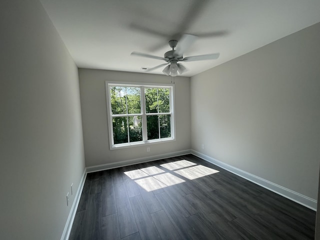 54 Charleston Cv, Clarksville, TN 37043 - empty room featuring ceiling fan and dark wood-style floors