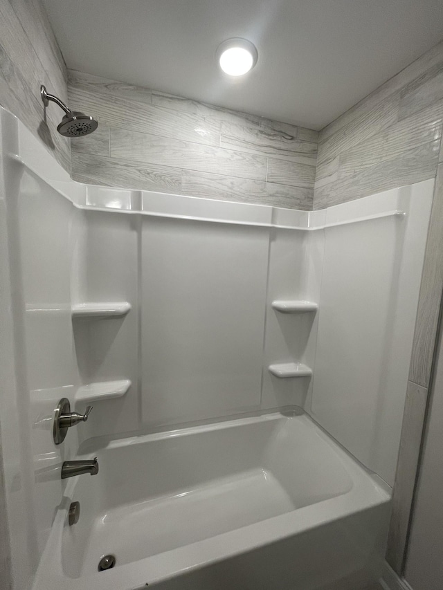 54 Charleston Cv, Clarksville, TN 37043 - bathroom featuring washtub / shower combination