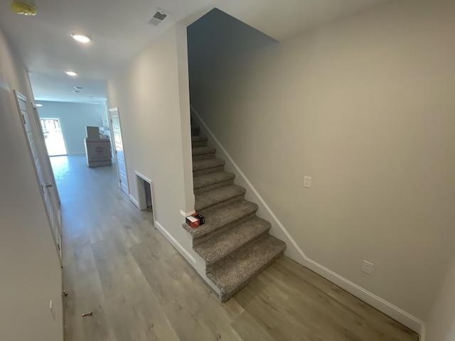 56 Charleston Cv, Clarksville, TN 37043 - stairs with wood finished floors and recessed lighting