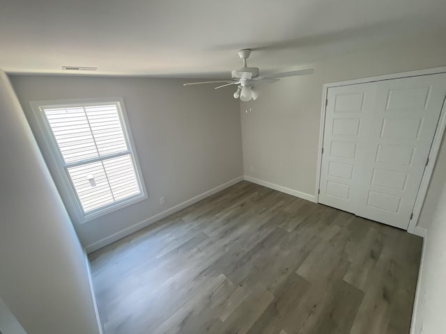 56 Charleston Cv, Clarksville, TN 37043 - unfurnished bedroom with wood finished floors and ceiling fan