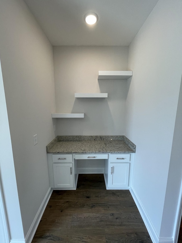 57 Charleston Cv, Clarksville, TN 37043 - unfurnished office featuring built in study area and dark wood-style floors
