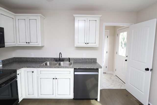 10172 Galen Rd, Lafayette, TN 37083 - kitchen featuring black appliances, a sink, dark countertops, and white cabinets