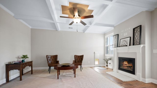 102 Murrell Rd, Dickson, TN 37055 - living area with coffered ceiling, a glass covered fireplace, ceiling fan, and beam ceiling