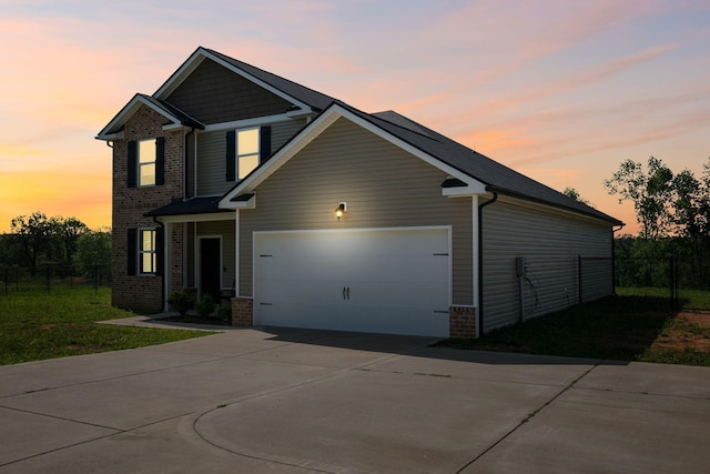 102 Murrell Rd, Dickson, TN 37055 - view of front of house featuring driveway, brick siding, and a garage