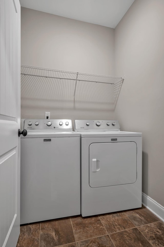 102 Murrell Rd, Dickson, TN 37055 - laundry area with independent washer and dryer and dark stone finish floors