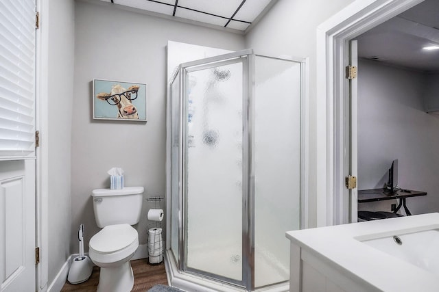 105 W Walnut St, Smithville, TN 37166 - full bathroom featuring a shower stall, wood finished floors, toilet, a paneled ceiling, and a sink