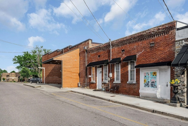 105 W Walnut St, Smithville, TN 37166 - view of building exterior with uncovered parking