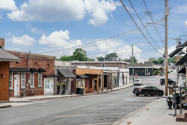 105 W Walnut St, Smithville, TN 37166 - view of asphalt road with sidewalks, curbs, and street lighting
