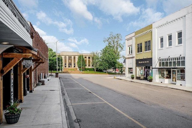 105 W Walnut St, Smithville, TN 37166 - view of asphalt street featuring street lighting, curbs, sidewalks, and traffic signs