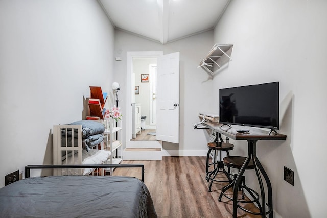 105 W Walnut St, Smithville, TN 37166 - bedroom featuring lofted ceiling, wood finished floors, and baseboards