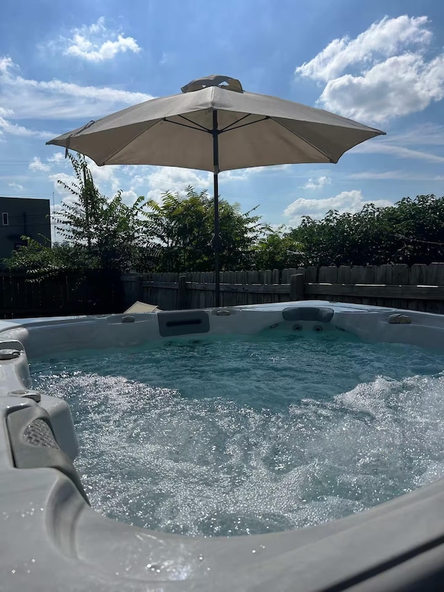 10B Fern Ave, Nashville, TN 37207 - view of swimming pool featuring a fenced backyard, a swimming pool, and a hot tub