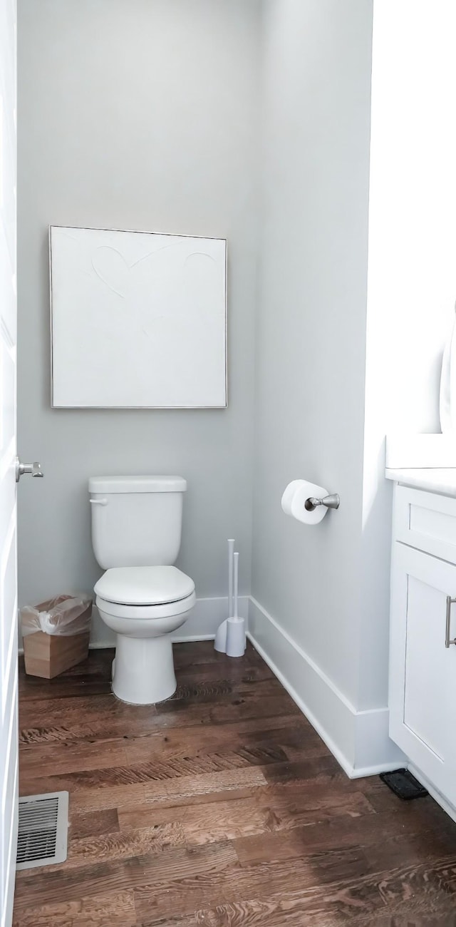 10B Fern Ave, Nashville, TN 37207 - half bathroom with toilet, wood finished floors, baseboards, and vanity