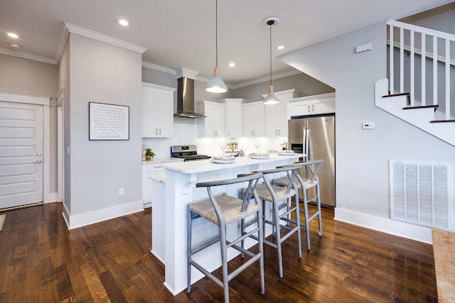 10B Fern Ave, Nashville, TN 37207 - kitchen with appliances with stainless steel finishes, wall chimney range hood, baseboards, dark wood-style floors, and light countertops
