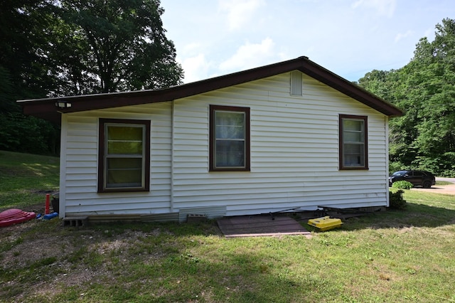 9097 Denton Rd, Linden, TN 37096 - view of side of home with a lawn