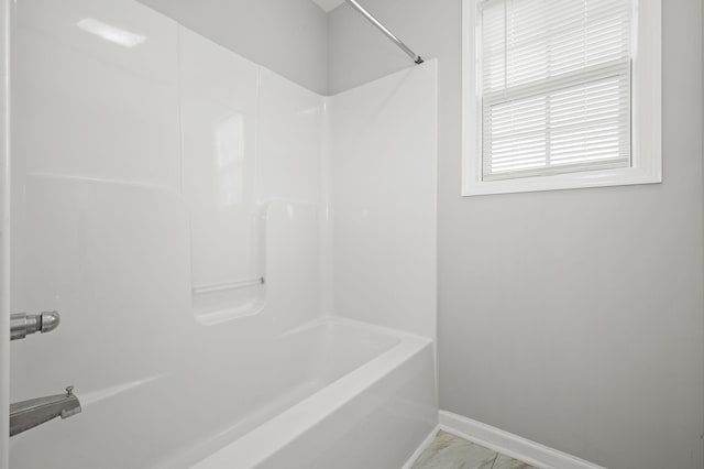 380 Strawberry Dr, Winchester, TN 37398 - full bathroom featuring baseboards, shower / tub combination, and marble look tiles