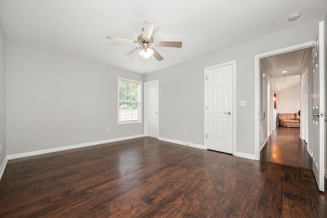 380 Strawberry Dr, Winchester, TN 37398 - unfurnished bedroom with attic access, dark wood-style floors, baseboards, and a ceiling fan