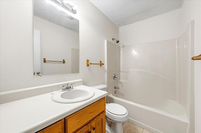 1910 Burlington Cir, Columbia, TN 38401 - bathroom featuring toilet, vanity, tile patterned floors, shower / tub combination, and a textured ceiling