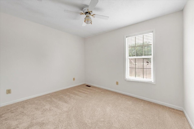 1910 Burlington Cir, Columbia, TN 38401 - empty room featuring light carpet, baseboards, and a ceiling fan