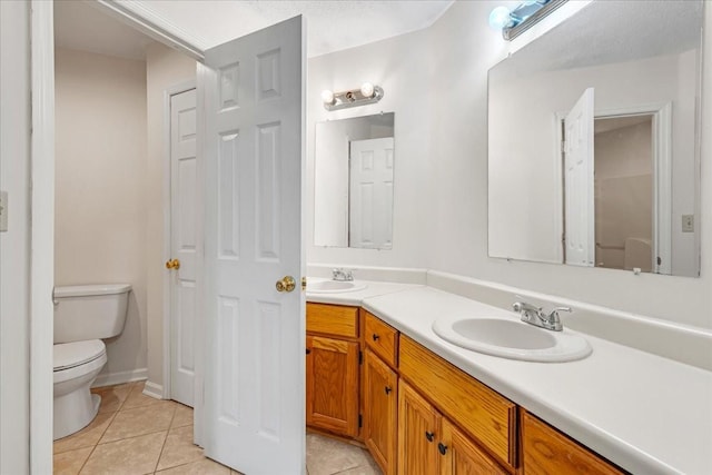 1910 Burlington Cir, Columbia, TN 38401 - bathroom with toilet, tile patterned floors, and double vanity