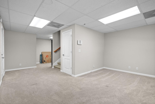 2829 Sharpie Dr, Clarksville, TN 37040 - finished below grade area featuring a drop ceiling, carpet, stairway, and baseboards