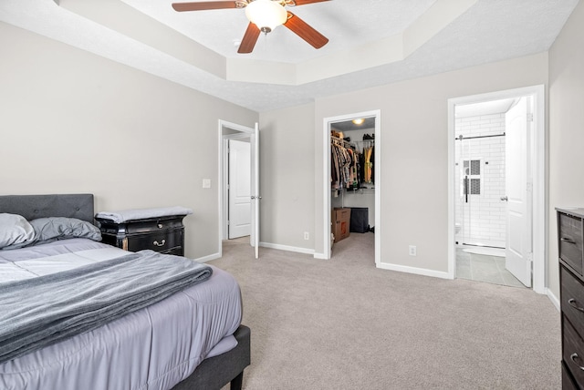 2829 Sharpie Dr, Clarksville, TN 37040 - bedroom featuring carpet, a walk in closet, baseboards, and a closet