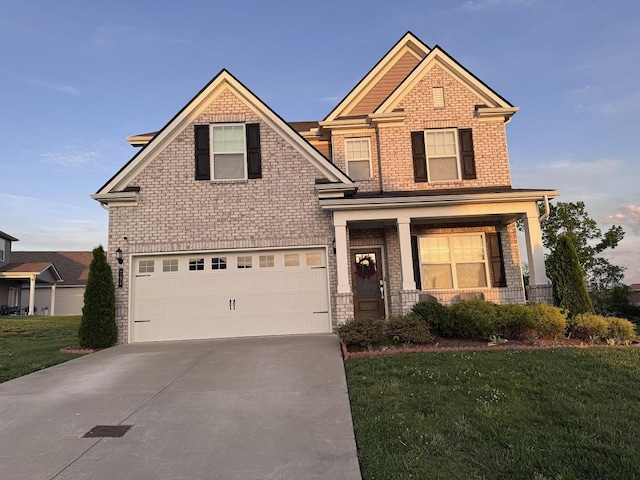 craftsman house with a garage, a front lawn, driveway, a porch, and brick siding
