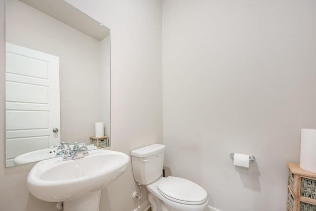 705 Watson Ct, Spring Hill, TN 37174 - half bath with baseboards, a sink, and toilet
