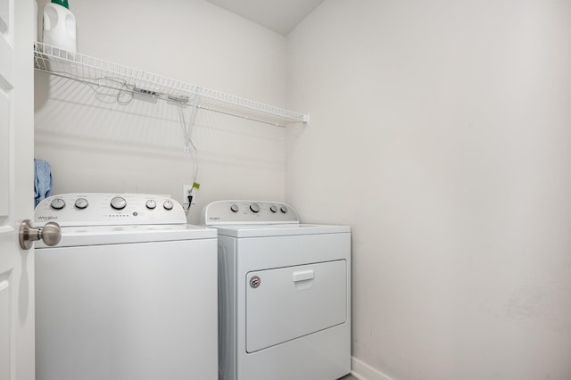 705 Watson Ct, Spring Hill, TN 37174 - laundry area featuring washing machine and clothes dryer and baseboards