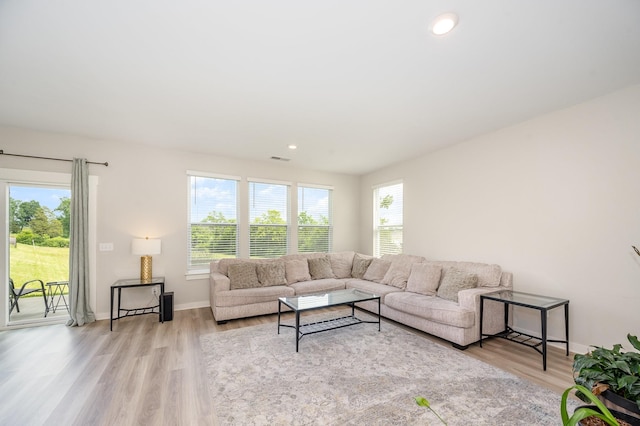 705 Watson Ct, Spring Hill, TN 37174 - living area featuring healthy amount of natural light, light wood finished floors, baseboards, and recessed lighting