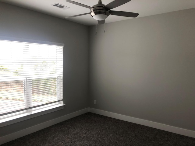 934 Governors Ct Unit 302, Antioch, TN 37013 - spare room with plenty of natural light, ceiling fan, dark colored carpet, and baseboards