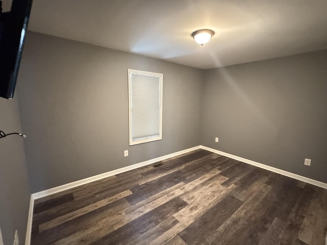 117 Raspberry Dr, Winchester, TN 37398 - unfurnished room with dark wood finished floors and baseboards